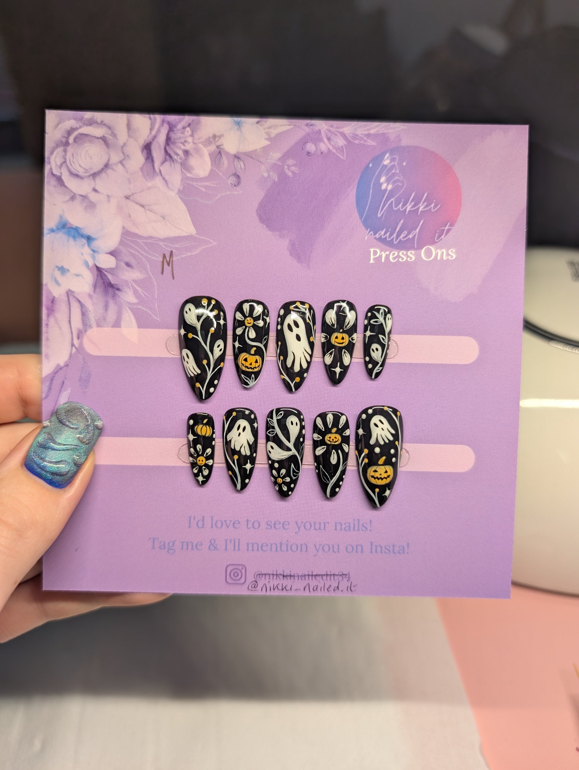 Hand Painted Press On Nails | Halloween Monochrome Press On Nails showcasing cute spooky designs on a purple display.