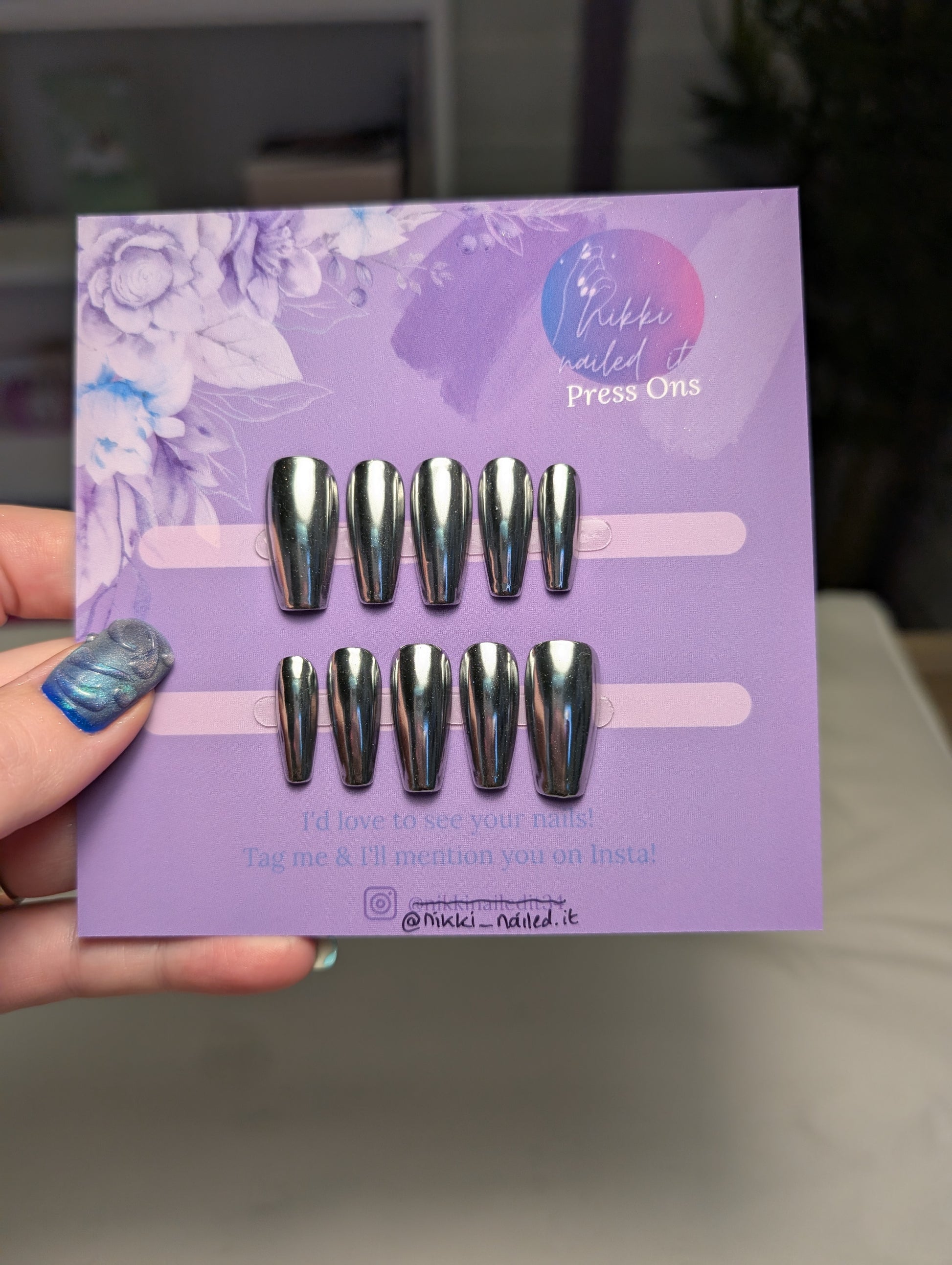 Hand Painted Press On Nails featuring Chrome Silver design on a purple display card showcasing Halloween nail art.